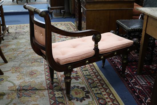 A pair of early 19th century American simulated rosewood chaises, L.3ft 9in. D.1ft 5in. H.2ft 11in.